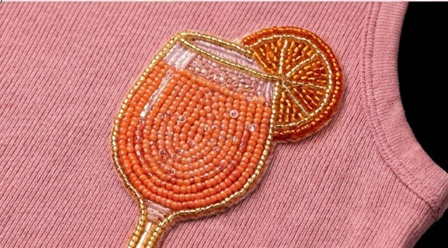 Embroidered Aperol spritz patch with an orange slice